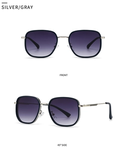Close-up of retro round metal sunglasses with silver frames and dark gray gradient lenses