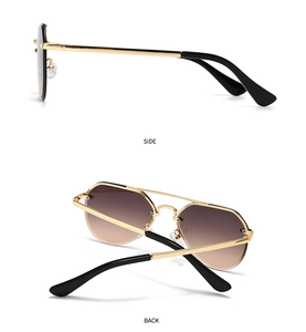 Detail view showing side and back profiles of vintage gold metal frame sunglasses