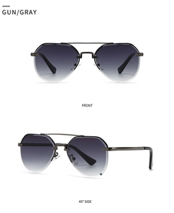 Detail view of gunmetal aviator sunglasses with gradient lenses and polygon cut edges