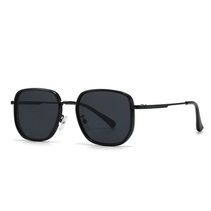 Modern round square black metal sunglasses with dark gray lenses shown in a 45-degree view