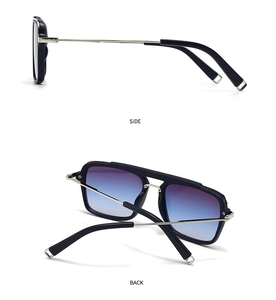 Detail view of vintage double-bridge sunglasses with gradient lenses and metal temples