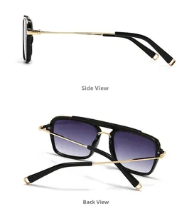 Detail view of large aviator sunglasses with gold temples and purple gradient lenses