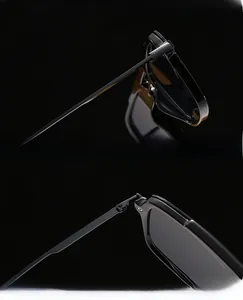 Macro detail of black square sunglasses featuring durable metal hinges and thick UV lenses