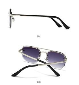 Detail of silver metal frame sunglasses showing side and back view with purple lenses