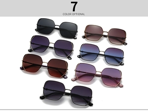 Detailed grid of narrow oval sunglasses in seven trendy gradient colors and metal frames