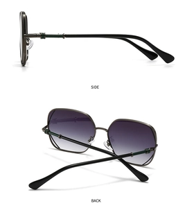 Detail view of slim metal sunglasses frames showing side hinge and back nose pads