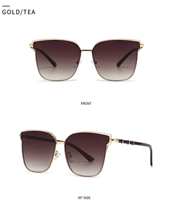 Front and side view of gold metal oversized sunglasses with gradient tea lenses