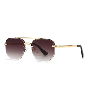 Retro slim rimless aviator sunglasses with gradient brown lenses and gold metal frame
