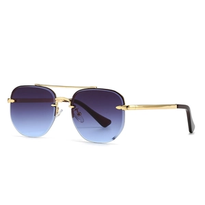 Modern rimless aviator sunglasses with gold metal frame and purple blue gradient lenses