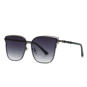 Vintage oversized sunglasses with gradient purple lenses and gunmetal openwork frame