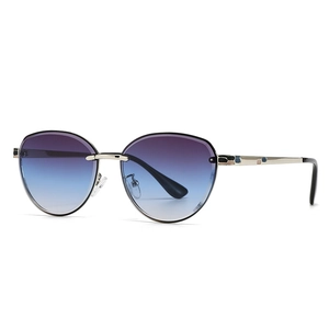 Modern retro narrow sunglasses for women with gold metal frame and gradient lenses