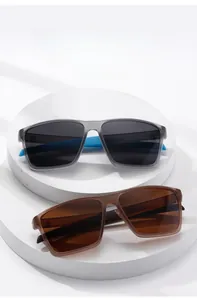 Detail view of square oversized sunglasses with chic gray and amber frames for face refining