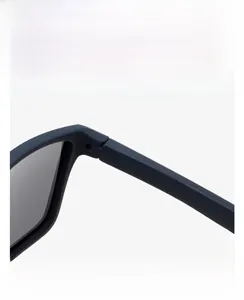 Macro detail showing the sturdy matte hinge construction of the vintage square sunglasses