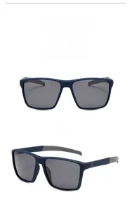 Detail view of matte navy square sunglasses with polarized lenses and geometric logo