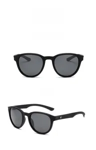 Front and side view of matte black polarized sunglasses with vintage round frame and grey lens
