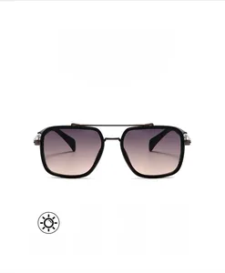 Detail view of square frame sunglasses with gradient purple lenses and double bridge design