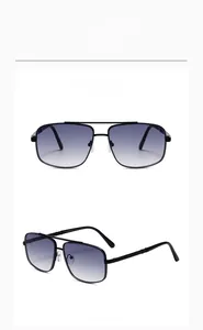 Detail of square black metal sunglasses featuring double bridge and gradient lenses