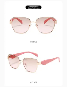 Detail view of narrow metal sunglasses with rose gold frames and pink gradient lenses