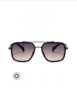 Detail view of double bridge metal frame sunglasses with gradient polarized lenses