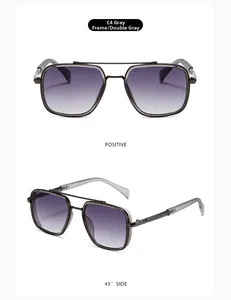 Close-up of gunmetal square double-bridge sunglasses with gradient grey lenses