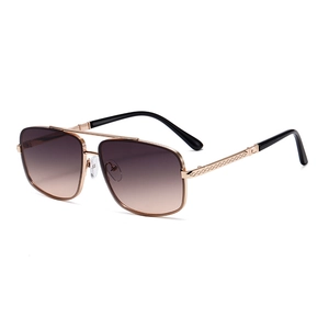Classic aviator sunglasses with gold metal frame, double bridge, and brown gradient lenses