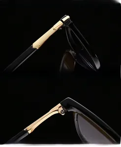 Macro detail of anti-blue light glasses showing reinforced gold metal hinges and thick UV lenses