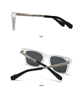 Detail view of double bridge aviator sunglasses with matte frames and metal hinges