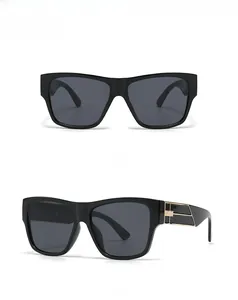 Front and 45-degree side views of black square sunglasses with gold metal decoration