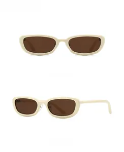 Front and side view of retro oval off-white sunglasses with tea-tinted lenses