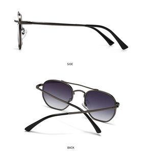Detail view of round metal sunglasses with gradient lenses and double bridge design