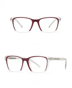 Detail of red and white two-tone square sunglasses with silver metal hinges