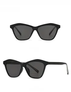 Front and 45 degree side views of black cat-eye sunglasses with dark tinted lenses