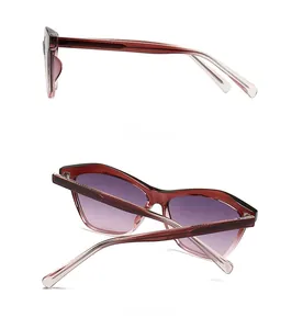 Side and back view of retro cat eye sunglasses with red-brown frames and purple lenses