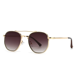 Retro round metal sunglasses with double bridge design and gradient brown lenses