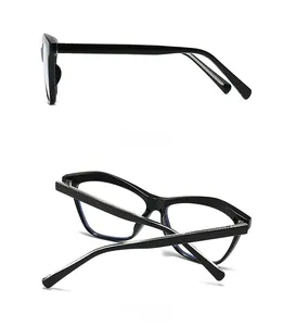Detailed side and back view of black cat-eye geometric sunglasses with metallic hinges