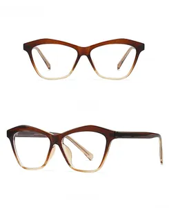 Front and 45-degree side view of vintage cat-eye sunglasses with gradient frames