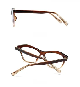 Detail view showing side and back of tortoiseshell cat-eye sunglasses with gradient frames