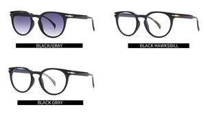 Detail of round frame blue light glasses and sunglasses with gold arrow hinges