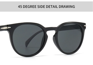 Detail view of round black glossy sunglasses with silver diamond metal studs on hinges