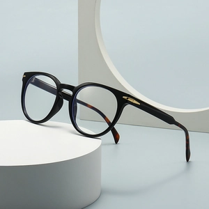Retro round full-rim glasses with gold arrow accents and blue light blocking lenses