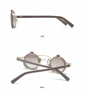 Detail view of round sunglasses with brown acetate frames and gold metal rivets