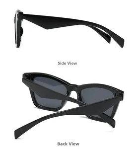 Detail view showing the wide geometric temples and back-folded side of oversized metal sunglasses