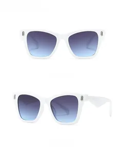 Front and side view of white oversized metal sunglasses with gray-blue gradient lenses