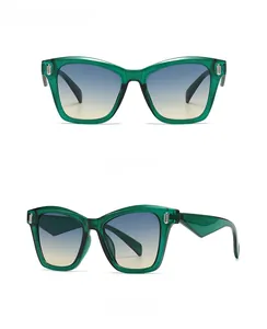 Green oversized sunglasses with blue gradient lenses shown from front and side view