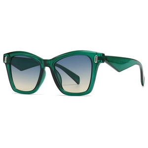 Oversized retro metal sunglasses with green transparent frames and gradient lenses