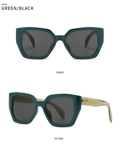 Detail view of green polygon sunglasses with gold geometric accents and black lenses