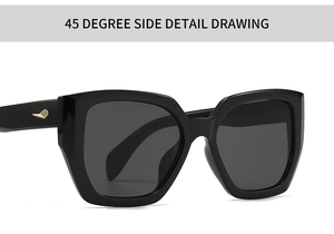 Close-up of polygon sunglasses with black frame and gold diamond metal temple detail
