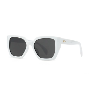 Modern white polygon sunglasses with dark grey lenses and gold diamond metal accents