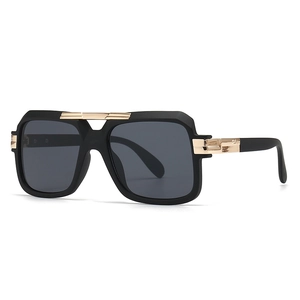 Classic pilot aviator sunglasses with black matte frame and gold bridge accents