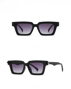Front and 45-degree side views of vintage square black sunglasses with gradient lenses